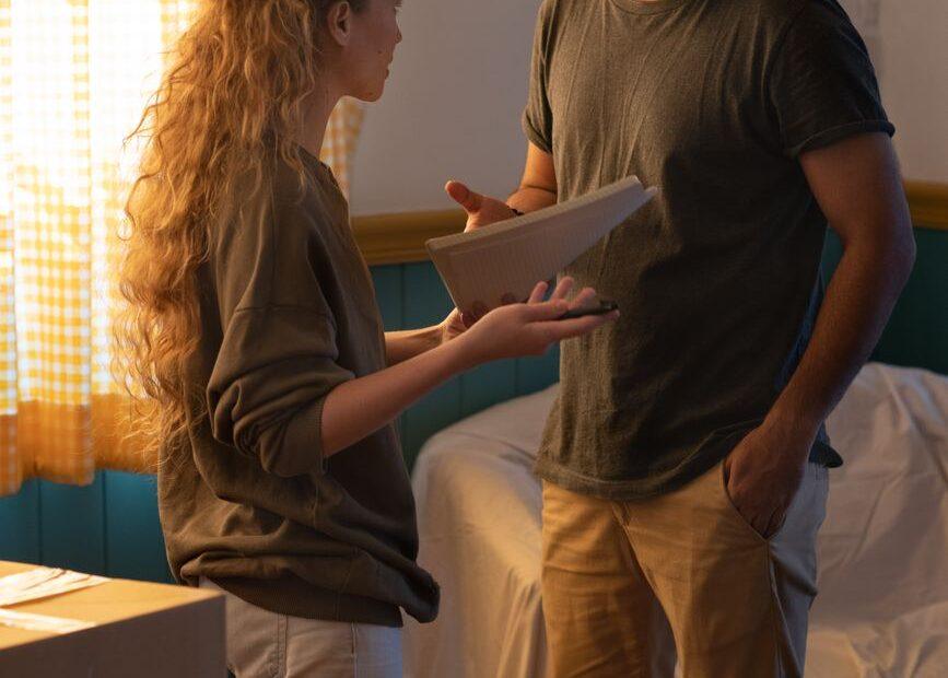 Illustration of How Couples Discuss Debt Before Moving in Together